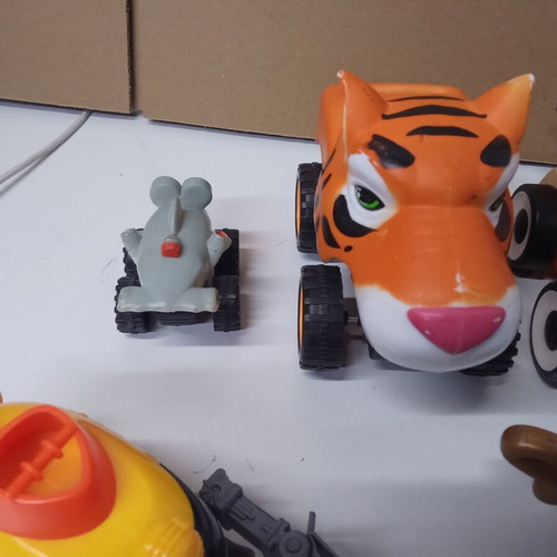 Children's toy set with submarine, cars, tractor, and magic lamp