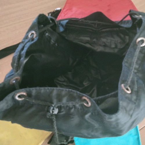 Backpack used with colorful cheerful designs and two front pockets
