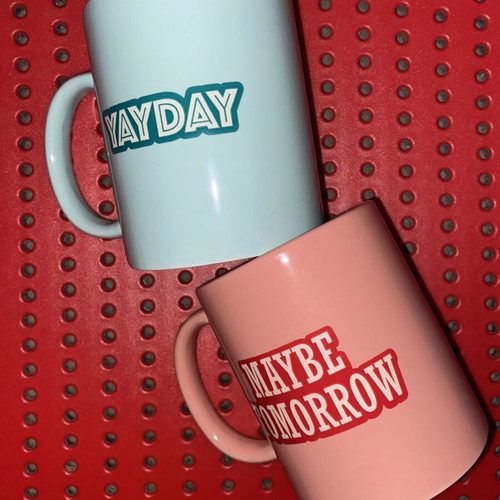 Set of 2 glass mugs used, pastel colors with prints
