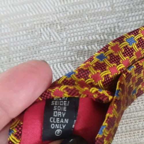 Frederick Theak silk tie like new, multicolored orange