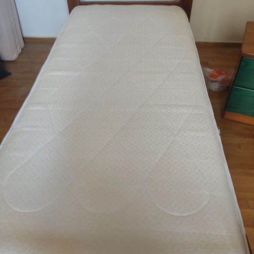 Wooden single bed with anatomical mattress and bedside table like new
