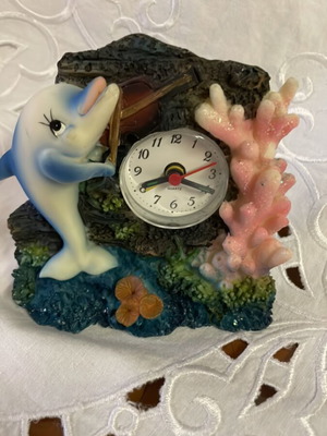 Clock with dolphin and alarm clock like new