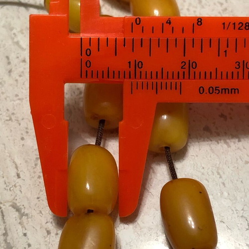 Worry beads used from royal amber with silver logo