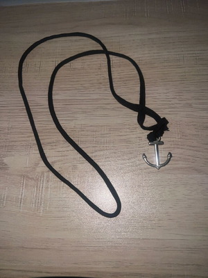 Necklace with black cord and anchor like new