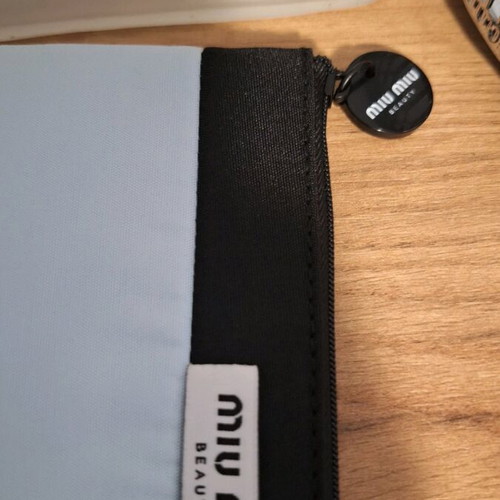 Miu Miu cosmetic pouch new, black and turquoise