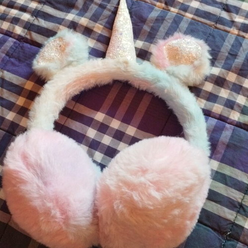 Children's winter unicorn ear protectors used