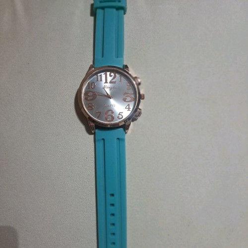 Women's watch used, rose gold with turquoise rubber strap