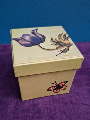 Green gift box with anemone and butterfly new