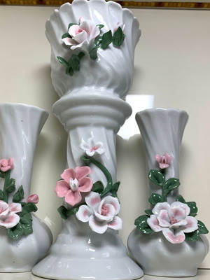 Porcelain set of two jars and flowerpot used with floral decoration