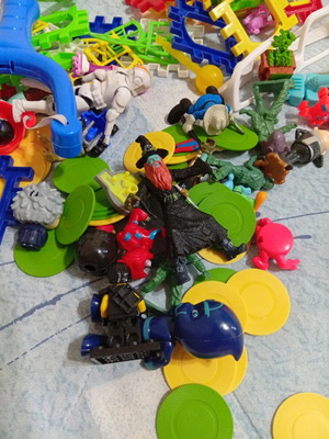 Toy pack with action figures, army men, and construction blocks like new