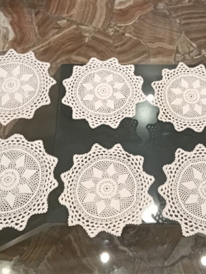 Handmade crochet doilies set of 9, star flower motif, 1965