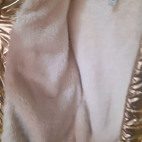 Short gold jacket with white fur and hood