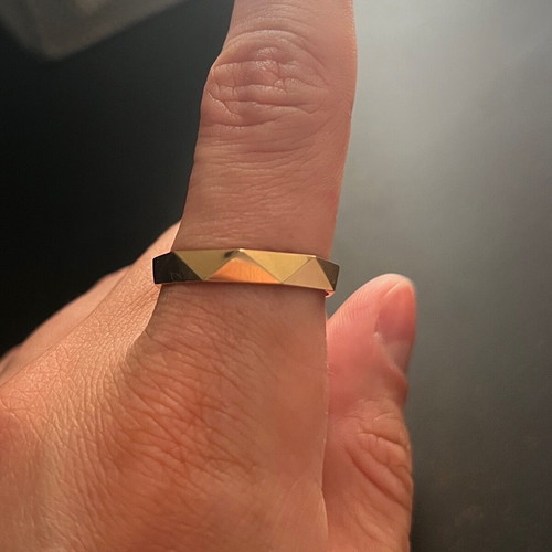 Gold ring like new, possibly stainless steel