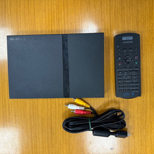 Sony PS 2 portable console used with cables and remote