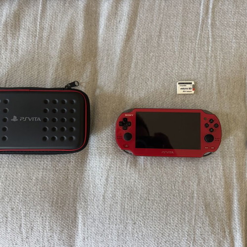 Sony PlayStation Vita 1000 like new with OLED screen and 128GB SD card