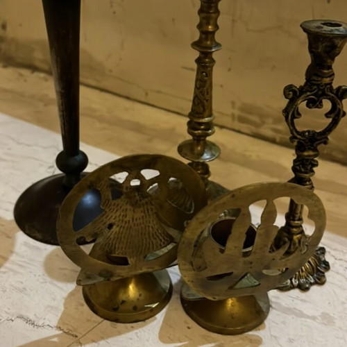 Set of 5 used bronze candlesticks