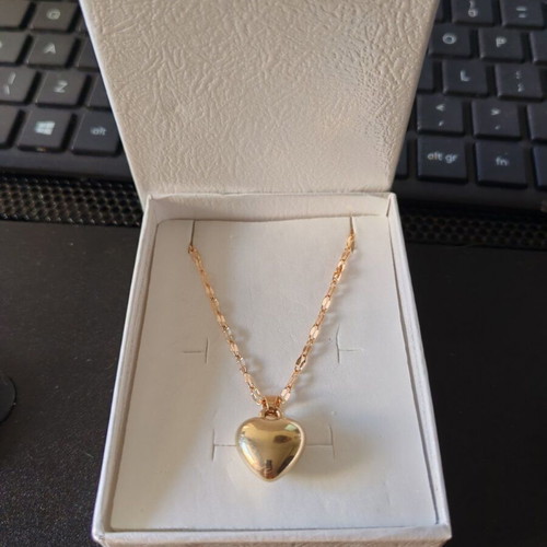Gold necklace with large puffy heart pendant like new