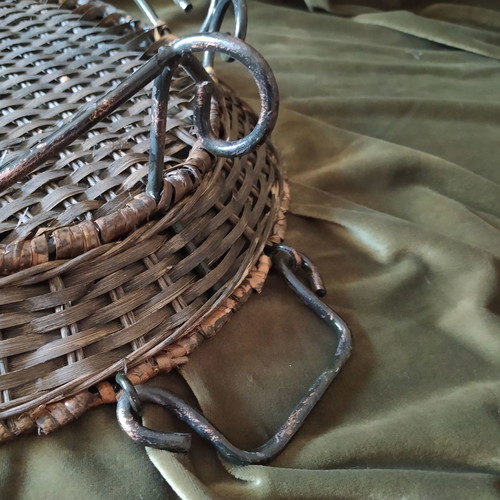 Woven rattan tray used with metal frame