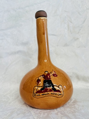 Vintage collectible 1965 glazed ceramic wine bottle used