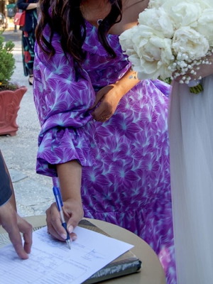 Irene Angelopoulos set used with top and long purple skirt