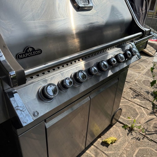 Napoleon Prestige Pro 665 gas grill used with hood and rotisserie