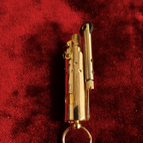 Vintage gold lighter stick-style, like new