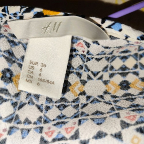 H&M blouse used with geometric ethnic pattern, viscose, short sleeve
