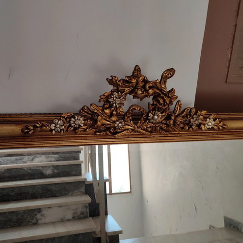 Carved mirror in gold color like new