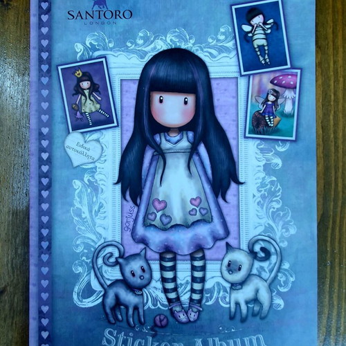 Santoro sticker album used with 8 missing stickers and correctly placed