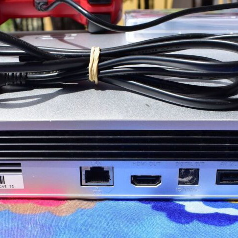 PlayStation 3 Slim 320GB Satin Silver console used with cables and controller