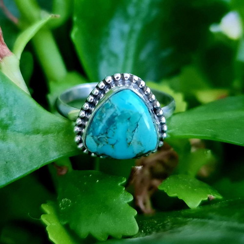 Silver turquoise ring new, size 7, Mohave stone