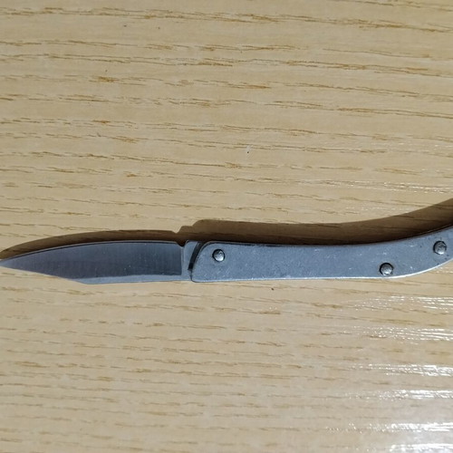Folding knife small used with light wear