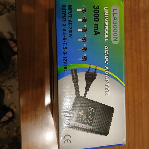 Universal AC/DC adapter new, adjustable power supply with multiple plugs