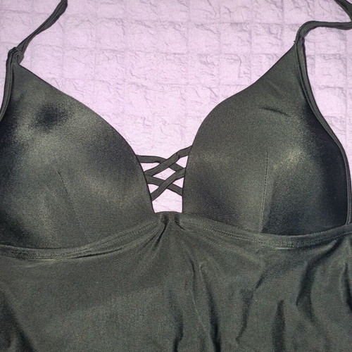 One-piece women's swimsuit large used, black, with special neckline