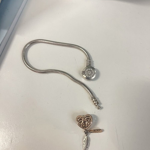 Pandora bracelet 17cm like new with charm, clasp repair needed