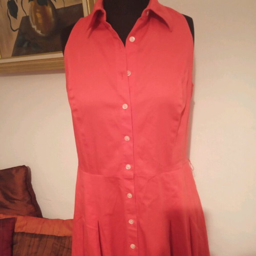 Dress with pleats and buttons used, size M
