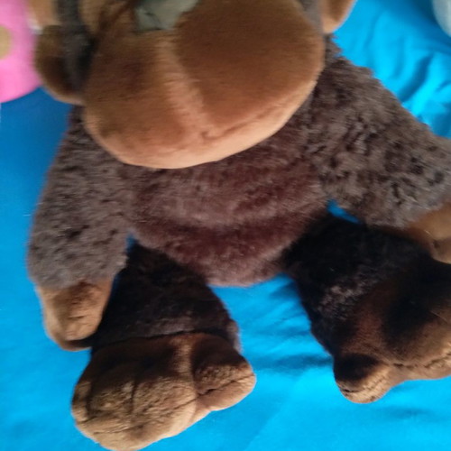 Plush monkey beautiful with small mark on back