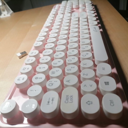 Wireless pink keyboard like new, full size with white round keys