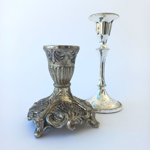 Set of old used small silver-plated candlesticks