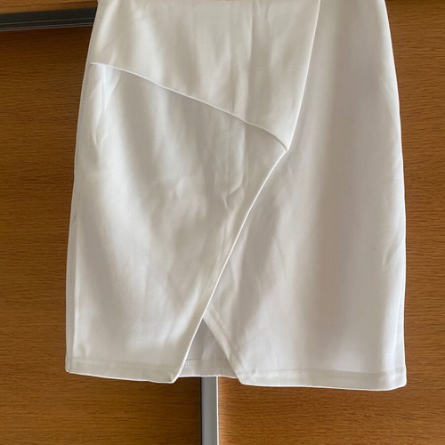 White skirt with unique front design like new