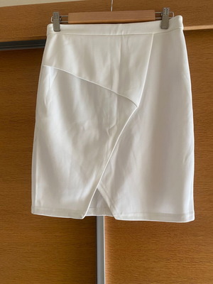 White skirt with unique front design like new