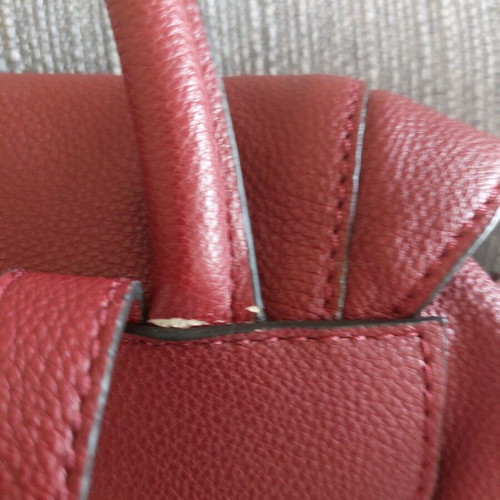 Guess backpack burgundy like new with minor handle wear