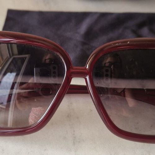 Burberry women's sunglasses used, burgundy with case