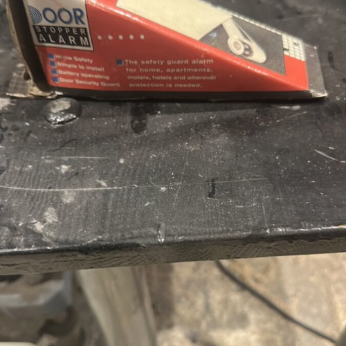 Door wedge with built-in alarm used