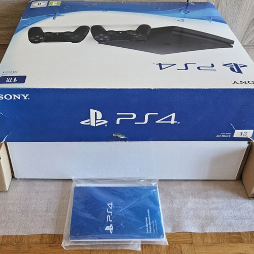 Sony PlayStation 4 Slim 1TB CUH-2016B original box used with manuals and inserts