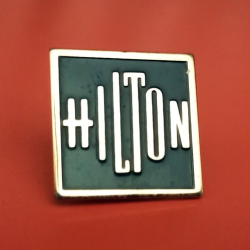 Hilton Hotel 80's pin used, black