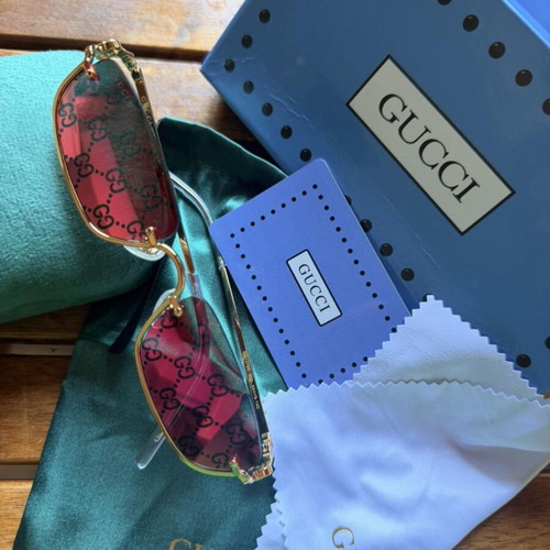 Gucci GG1278S 005 sunglasses, pink GG monogram, gold frame