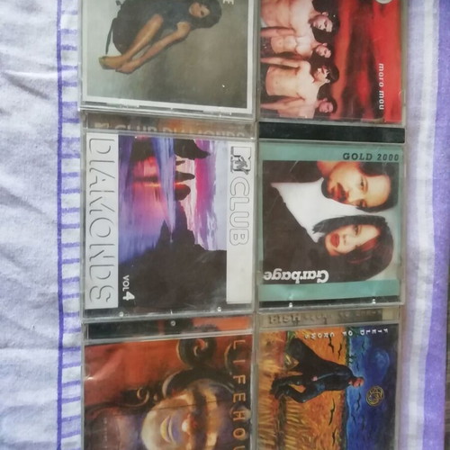 CD collection with Fish, Garbage, One, Lifehouse, MTV Club, Dannii Minogue