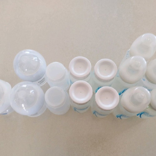 Baby bottles and milk storage containers, pack of 14