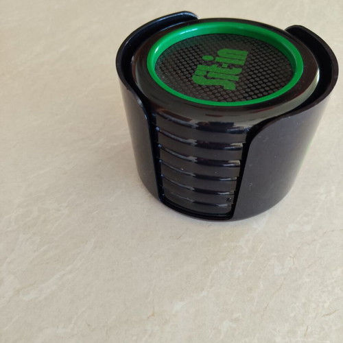 Coaster set of six plastic pieces with holder, like new